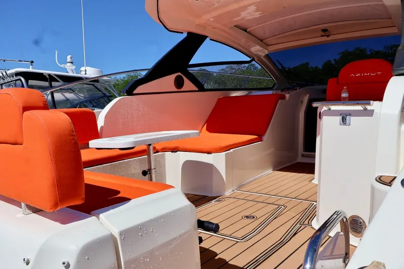  Yacht Photos Pics 2014 Azimut 38 yacht interior with orange seating and sleek design.
