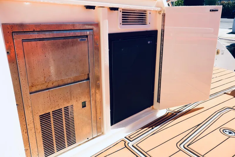  Yacht Photos Pics Outdoor kitchen area on a 2014 Azimut 38 yacht with stainless steel appliances.