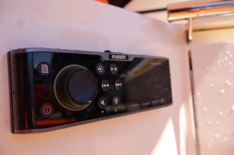  Yacht Photos Pics Fusion audio control panel on 2014 Azimut 38 yacht, featuring various buttons and a dial.
