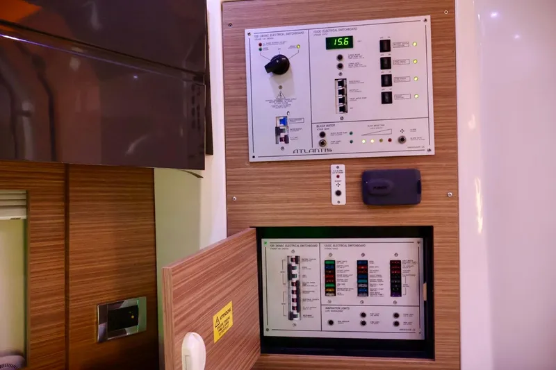  Yacht Photos Pics Control panel of a 2014 Azimut 38 yacht, featuring electrical switchboards.