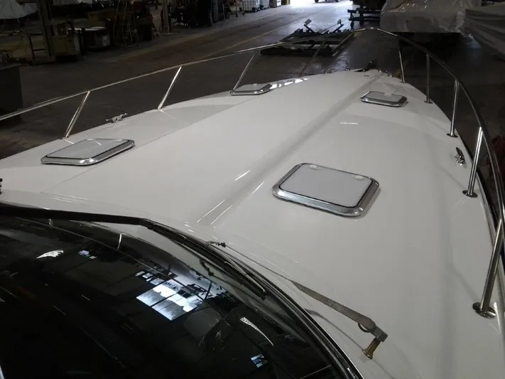 Lucky Yacht Photos Pics 2018 Formula 370 Super Sport boat deck with hatches.