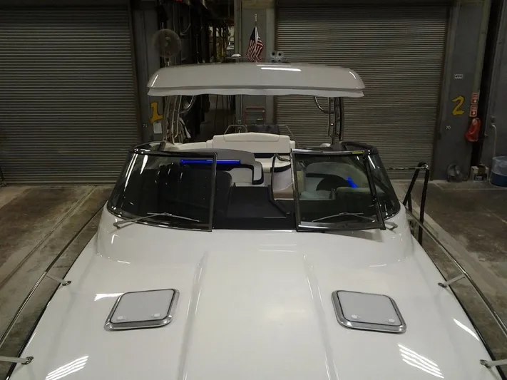Lucky Yacht Photos Pics 2018 Formula 370 Super Sport boat in a storage facility.