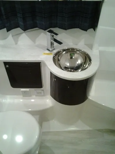 Lucky Yacht Photos Pics Interior of 2018 Formula 370 Super Sport boat with sink and toilet.