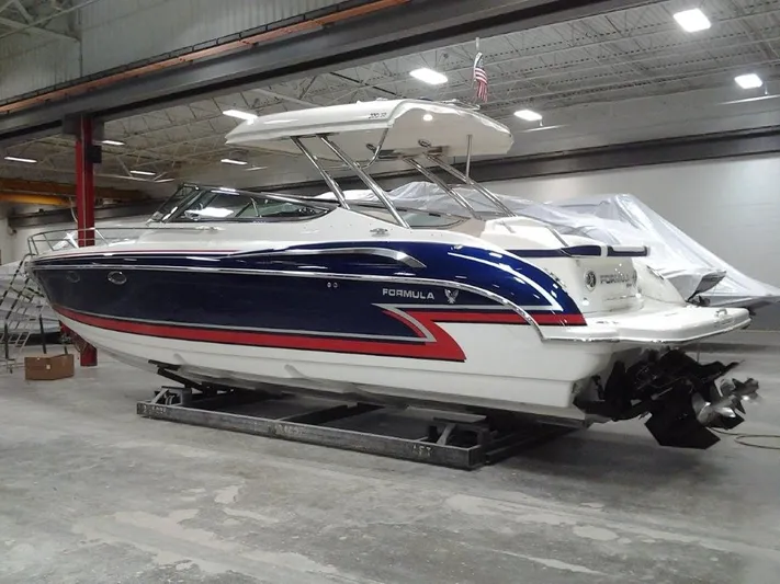 Lucky Yacht Photos Pics 2018 Formula 370 Super Sport boat in a storage facility.