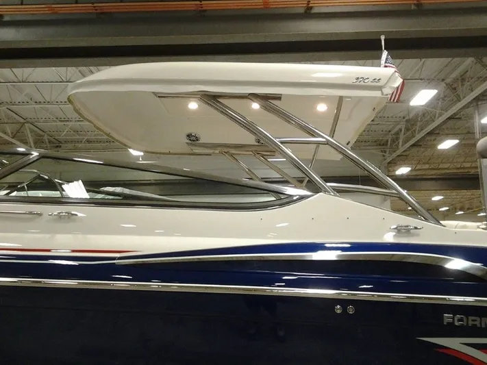 Lucky Yacht Photos Pics 2018 Formula 370 Super Sport boat in a showroom.