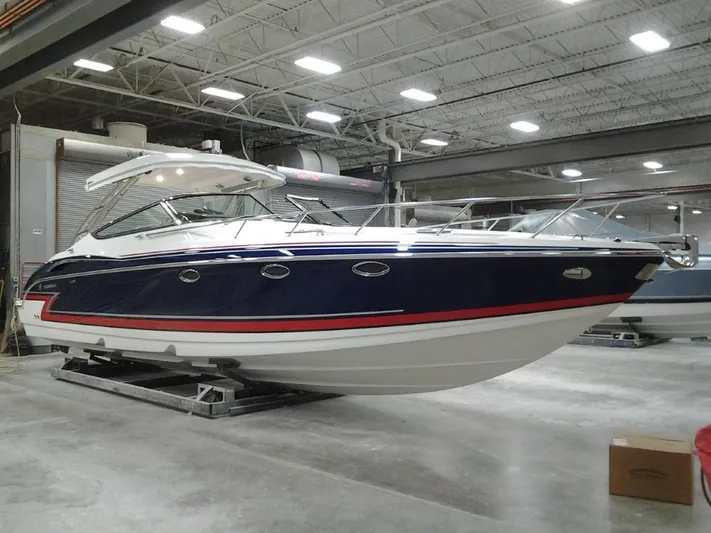 Lucky Yacht Photos Pics 2018 Formula 370 Super Sport boat in a warehouse.