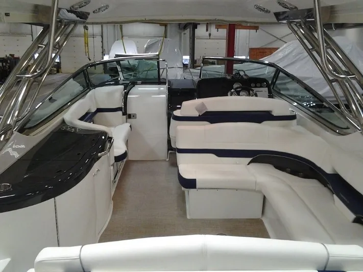 Lucky Yacht Photos Pics Interior of a 2018 Formula 370 Super Sport yacht with white seating.