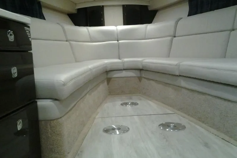 Lucky Yacht Photos Pics Interior of 2018 Formula 370 Super Sport boat with beige sofa.