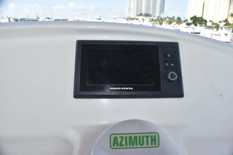  Yacht Photos Pics Control panel of 2015 Silverton 43 Sport Bridge with Volvo Penta display and Azimuth indicator.