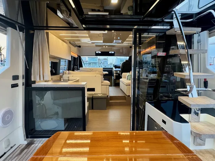  Yacht Photos Pics Luxurious interior of 2017 Cranchi E 52 F yacht with modern furnishings and elegant design.