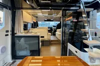 Luxurious interior of 2017 Cranchi E 52 F yacht with modern furnishings and elegant design.