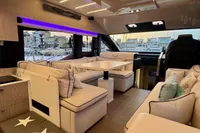 Luxurious interior of 2017 Cranchi E 52 F yacht with plush seating and modern design.