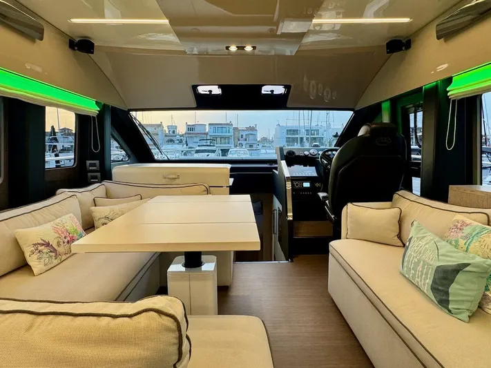  Yacht Photos Pics Luxurious interior of 2017 Cranchi E 52 F yacht with elegant seating and modern design.