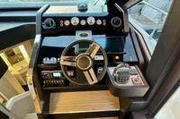 2017 Cranchi E 52 F yacht helm with modern controls and sleek design.