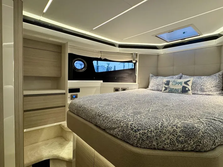  Yacht Photos Pics Luxurious bedroom interior of 2017 Cranchi E 52 F yacht with elegant bedding and modern design.