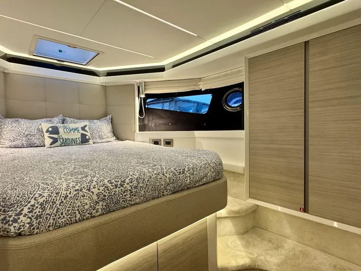  Yacht Photos Pics Luxurious interior of 2017 Cranchi E 52 F yacht with elegant bedding and modern design.