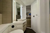 Modern bathroom interior of 2017 Cranchi E 52 F yacht, featuring sleek design and fixtures.