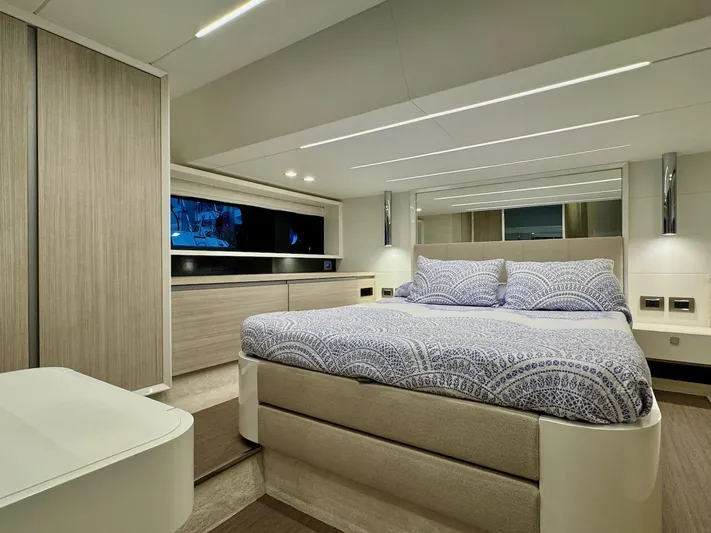  Yacht Photos Pics Luxurious bedroom interior of 2017 Cranchi E 52 F yacht with modern design.