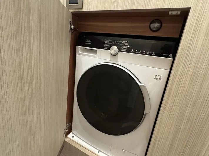  Yacht Photos Pics Washing machine inside a Cranchi E 52 F yacht, 2017 model.