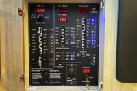 Electrical control panel of a 2017 Cranchi E 52 F yacht, displaying various switches and indicators.