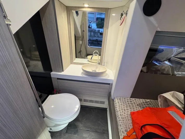  Yacht Photos Pics 2017 Cranchi E 52 F yacht bathroom with modern fixtures and compact design.