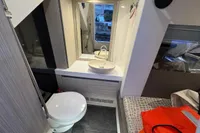 2017 Cranchi E 52 F yacht bathroom with modern fixtures and compact design.