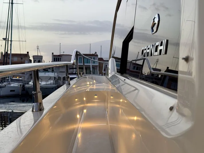  Yacht Photos Pics 2017 Cranchi E 52 F yacht docked at marina during sunset.