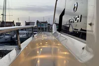 2017 Cranchi E 52 F yacht docked at marina during sunset.