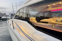 2017 Cranchi E 52 F yacht docked, showcasing sleek design and luxurious interior.