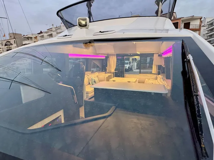  Yacht Photos Pics 2017 Cranchi E 52 F yacht interior with modern design and ambient lighting.