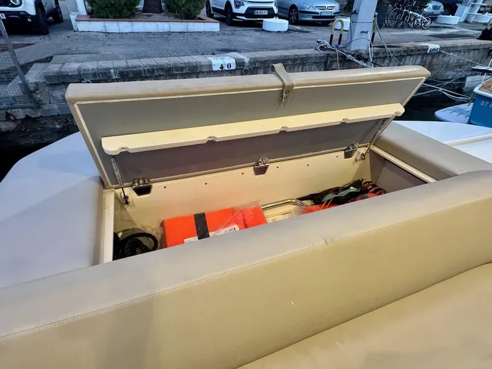  Yacht Photos Pics Storage compartment on 2017 Cranchi E 52 F yacht, containing life jackets and equipment.