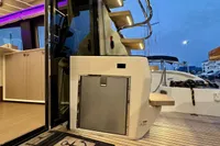Cranchi E 52 F 2017 yacht interior with wooden stairs and modern design elements.