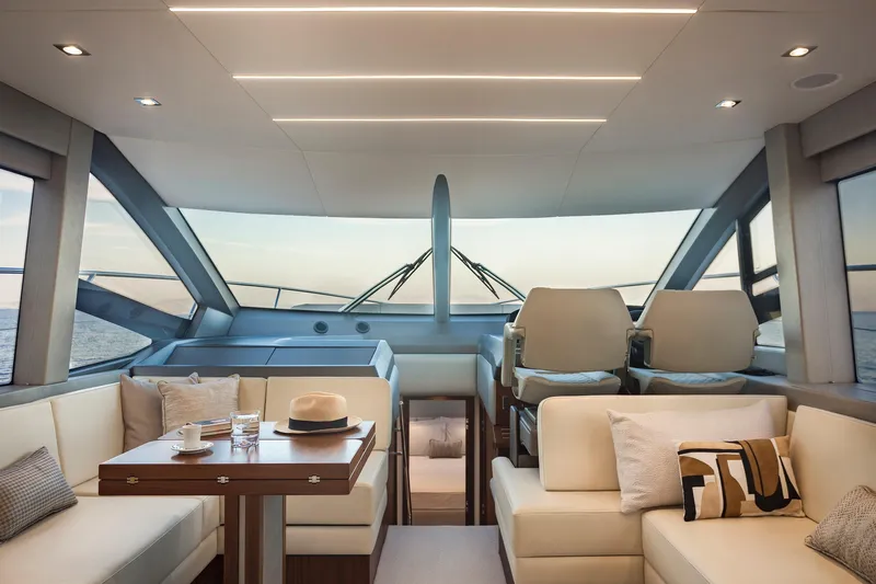 M/y Lady K Yacht Photos Pics Luxurious interior of 2018 Sunseeker Manhattan 52 yacht with elegant seating and panoramic windows.