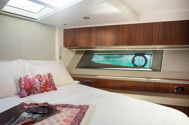M/y Lady K Yacht Photos Pics Luxurious cabin interior of 2018 Sunseeker Manhattan 52 yacht with elegant bedding.