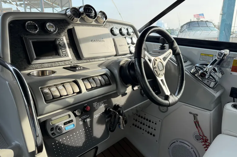  Yacht Photos Pics Cockpit of 2009 Formula 350 Sun Sport with Garmin navigation system and control panel.