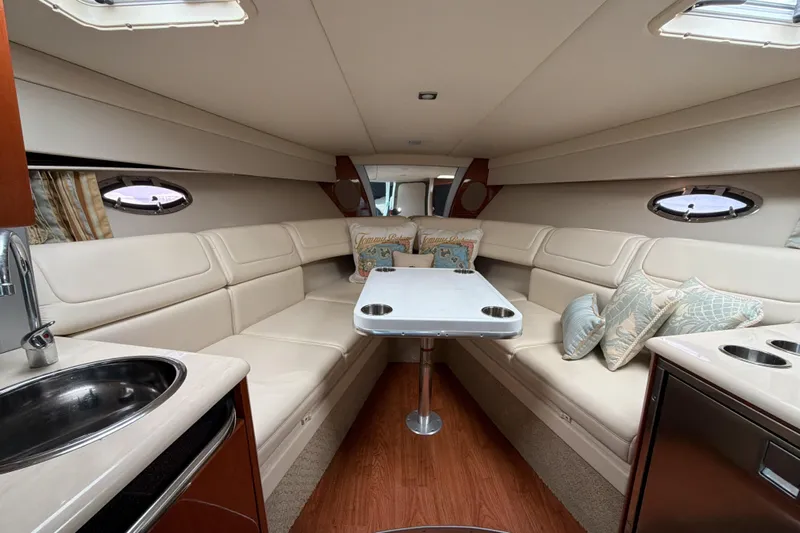  Yacht Photos Pics Luxurious interior of 2009 Formula 350 Sun Sport boat with plush seating and modern amenities.