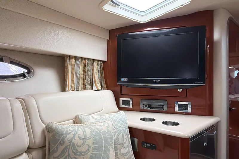  Yacht Photos Pics Interior of 2009 Formula 350 Sun Sport with TV, seating, and elegant decor.