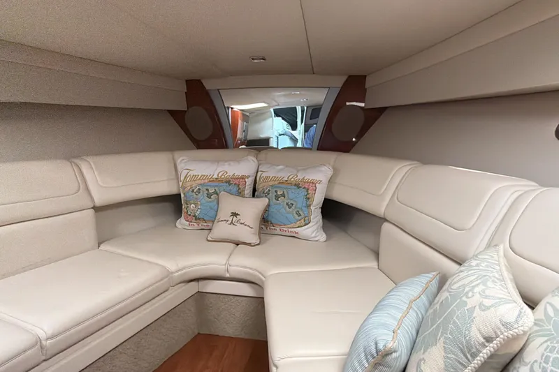  Yacht Photos Pics Luxurious interior of 2009 Formula 350 Sun Sport boat with plush seating and decorative pillows.