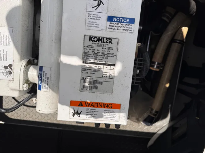  Yacht Photos Pics Kohler generator label on a 2009 Formula 350ss, showing specifications and safety warnings.