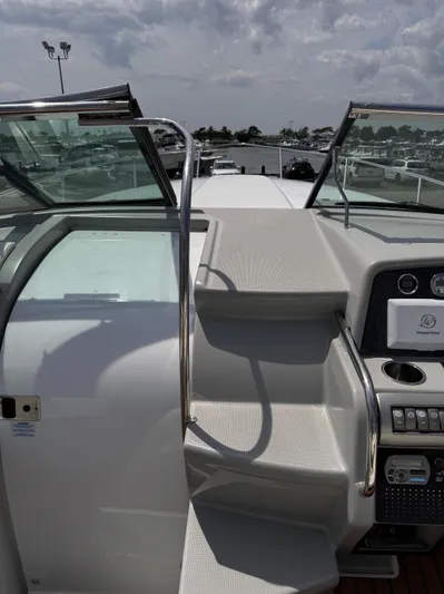  Yacht Photos Pics 2009 Formula 350ss boat cockpit with dashboard and steps, docked at marina.
