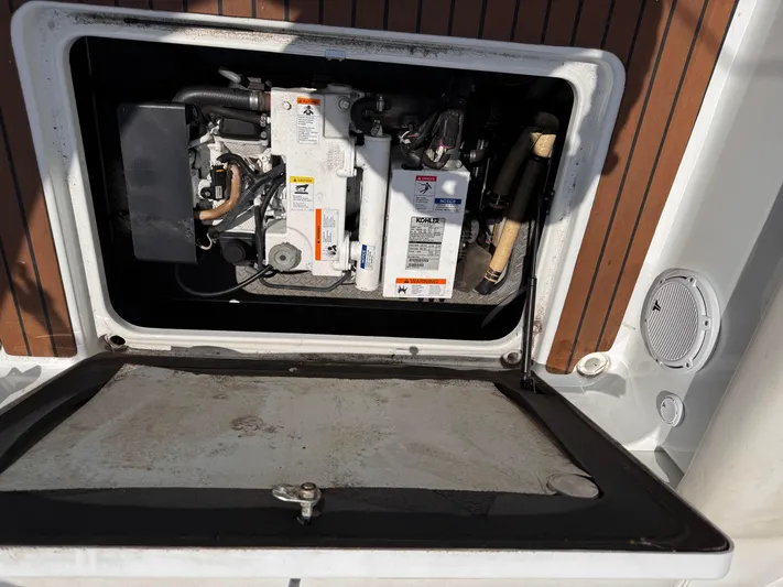  Yacht Photos Pics Engine compartment of a 2009 Formula 350SS boat, featuring a Kohler generator.
