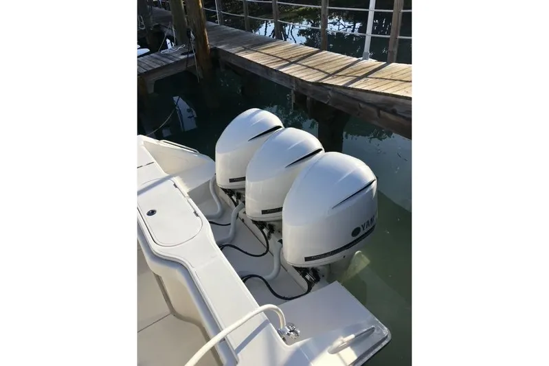  Yacht Photos Pics 2015 Jupiter 41 SB boat with triple Yamaha outboard engines at dock.