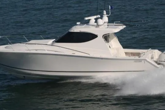  Yacht Photos Pics 2015 Jupiter 41 SB boat cruising on open water.