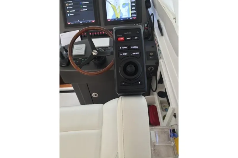 Yacht Photos Pics Control panel of a 2015 Jupiter 41 SB boat with Garmin navigation system.