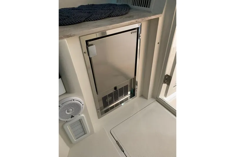  Yacht Photos Pics 2015 Jupiter 41 SB interior with stainless steel fridge and speaker.