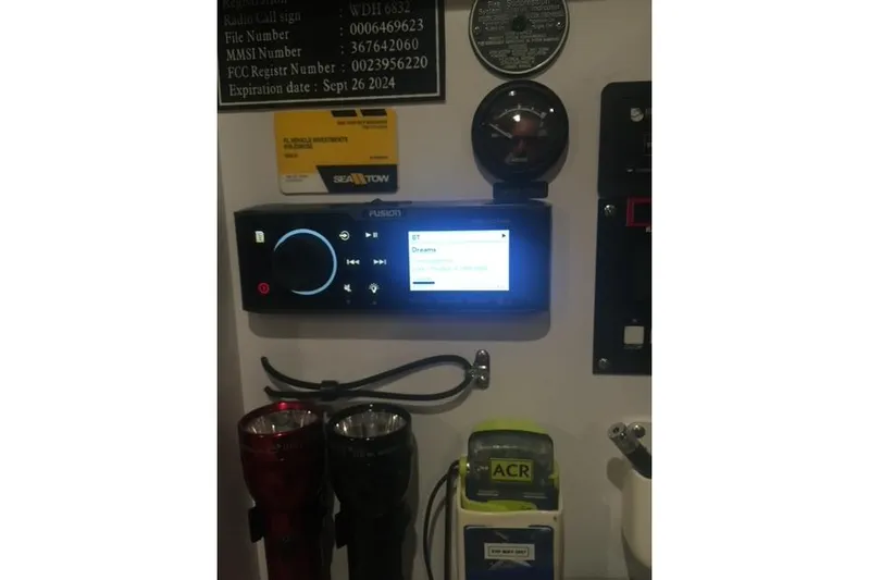  Yacht Photos Pics Control panel of a 2015 Jupiter 41 SB boat with various instruments and devices.