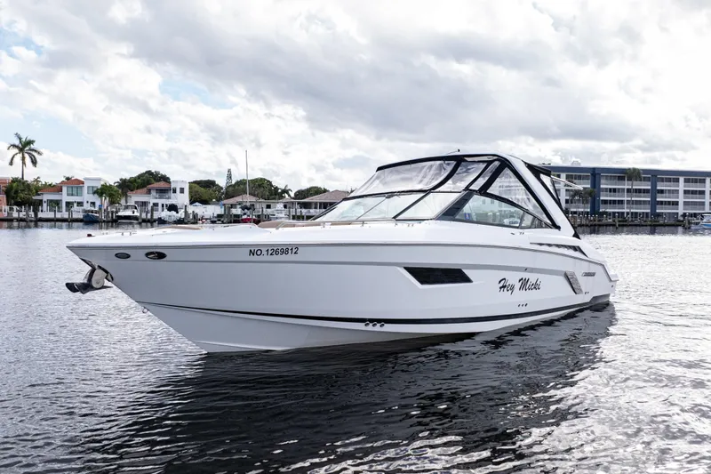  Yacht Photos Pics 2015 Cruisers Yachts 338 Bow Rider on water, with modern design and sleek lines.