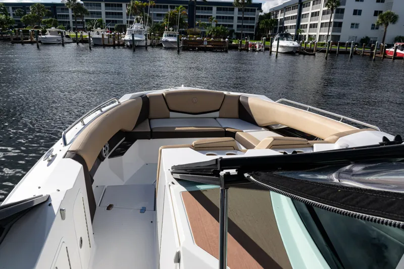  Yacht Photos Pics 2015 Cruisers Yachts 338 Bow Rider on water, featuring spacious seating and modern design.