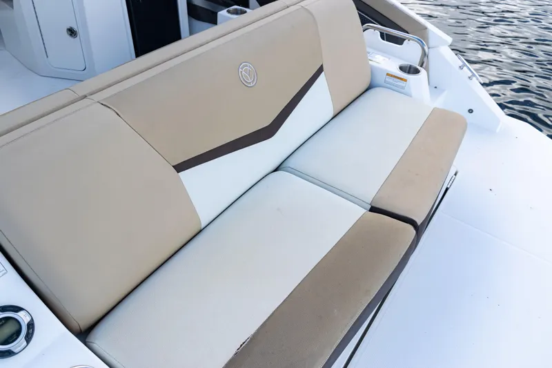  Yacht Photos Pics 2015 Cruisers Yachts 338 Bow Rider, beige and white seating, on water.