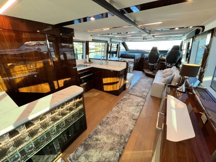 Blind Date Yacht Photos Pics Luxurious interior of 2020 Fairline Squadron 68 yacht with modern furnishings and elegant design.